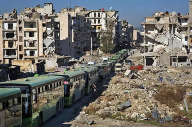 Buses parked in rebel-held eastern Aleppo, awaiting authorisation to leave (15 December 2016)