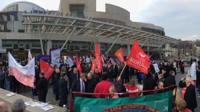 Unions gathered for an anti-cuts rally outside Holyrood in advance of the budget statement