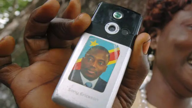 Phone with Kabila picture on it