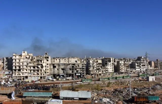 Buses are seen during an evacuation operation of rebel fighters and their families from rebel-held areas of Aleppo