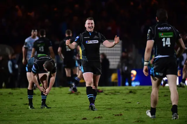 Glasgow full-back Stuart Hogg celebrates victory over Racing 92 with team-mate Tommy Seymour