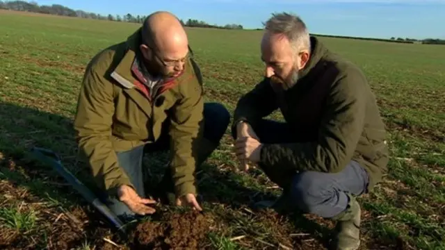 Jake Freestone on a field with David Gregory-Kumar