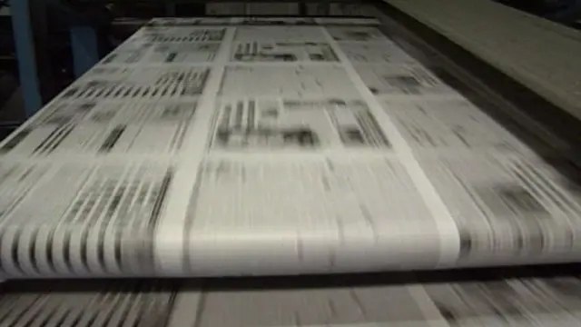 Newspapers coming off the press