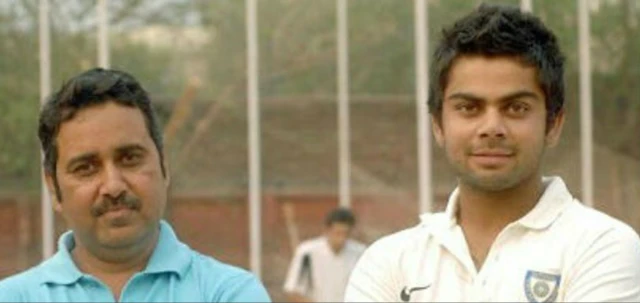 Virat Kohli and Rajkumar Sharma.