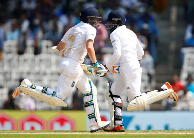 England's Liam Dawson and Adil Rashid