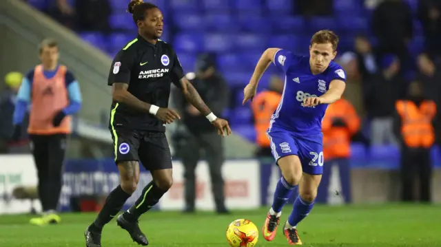 Brighton's Gaetan Bong and Greg Stewart of Birmingham City