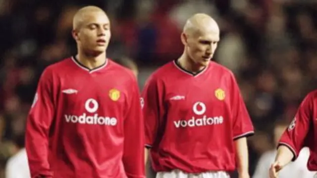 Wes Brown and Jaap Stam