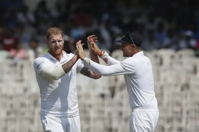 England celebrate the wicket of Pujara