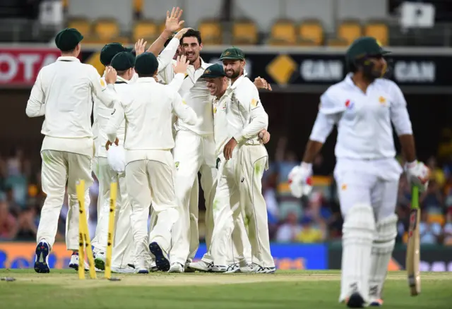 Australia celebrate a wicket against Pakistan