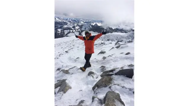 Andrew Lloyd on top of Galdhopiggen in Norway