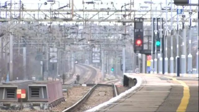 Rail line with overhead cables