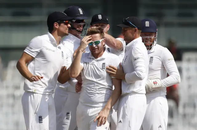 Liam Dawson celebrates his first Test wicket