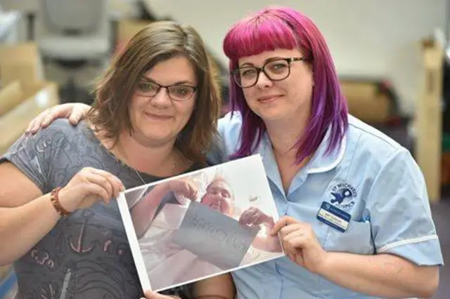 Andrea Hanvey and Amy Duncan with a photo of Neil
