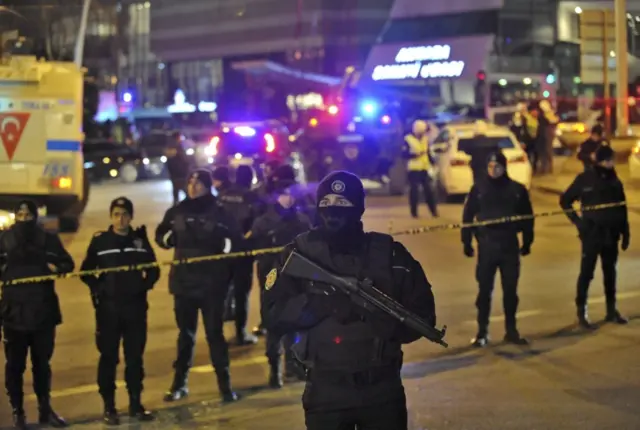 Turkish police officers in Ankara cordon off the area close to a photo gallery where the Russian Ambassador to Turkey, Andrei Karlov, was shot and killed by a gunman