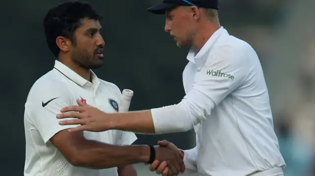 Karun Nair is congratulated by England's Joe Root on his triple century