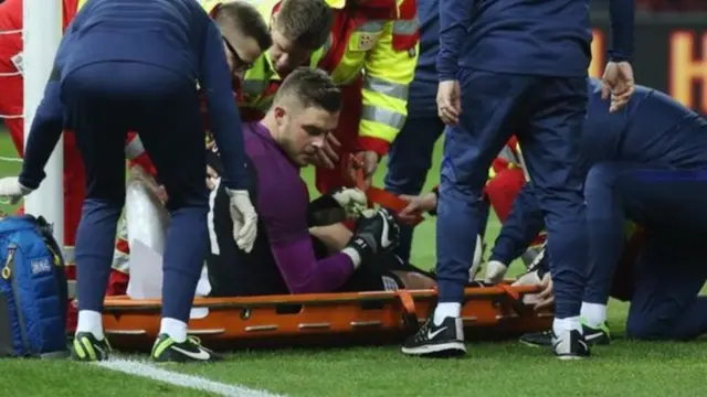 Jack Butland on stretcher at England game