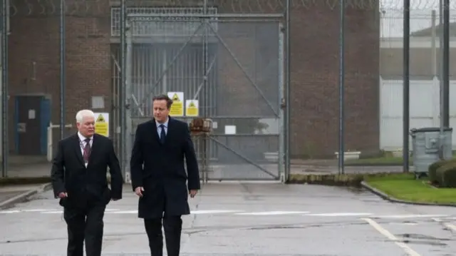 Former prime minster David Cameron was shown around HMP Onley by governor Stephen Ruddy earlier this year