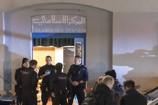 Police outside an Islamic centre in the Swiss city of Zurich