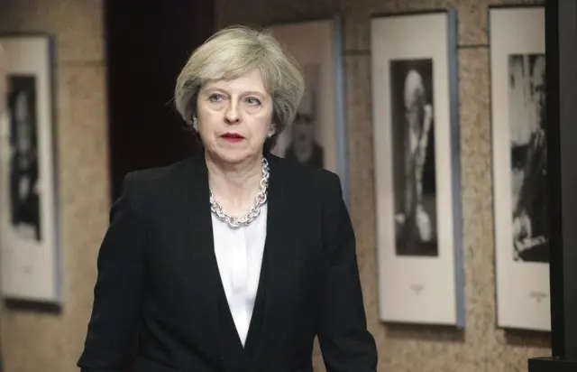 British Prime Minister Theresa May leaves the building after an EU Summit in Brussels on Thursday, Dec. 15, 2016.