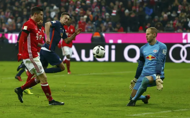 Robert Lewandowski of Bayern Munich tries to score