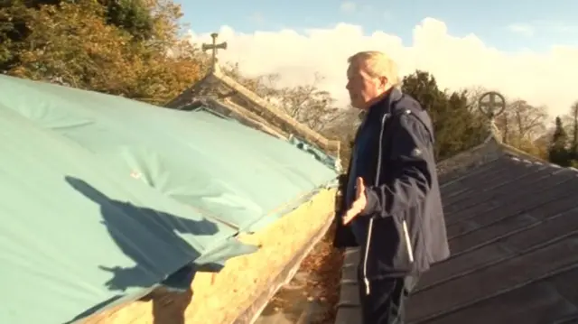 Temporary plastic on a church roof