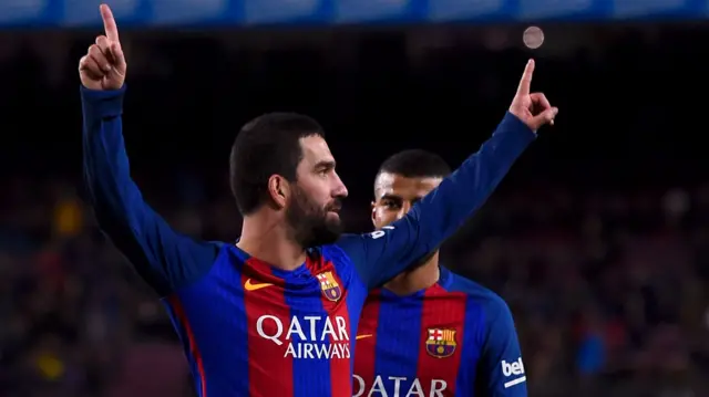 Arda Turan celebrates