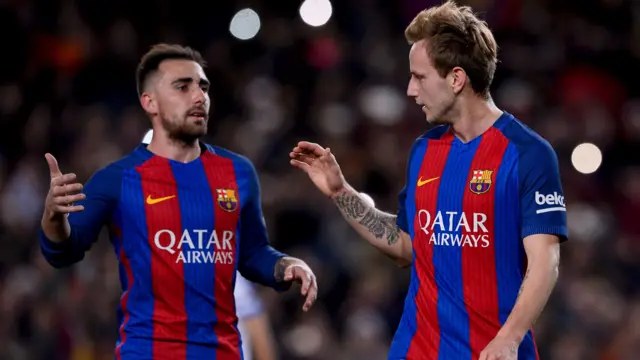 Ivan Rakitic is congratulated