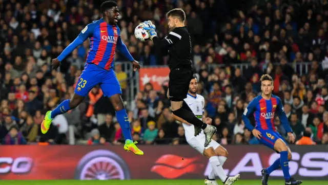 Samuel Umtiti of FC Barcelona competes for a high ball with Ivan Buigues of Hercules