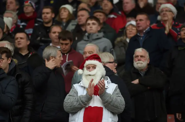 Fan dressed as Santa