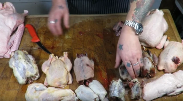 Man chopping birds