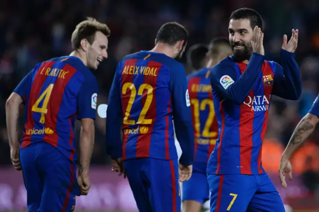 Arda Turan celebrates