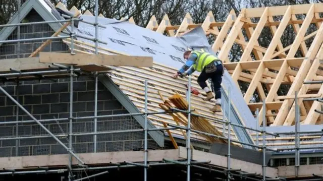 Builder on roof