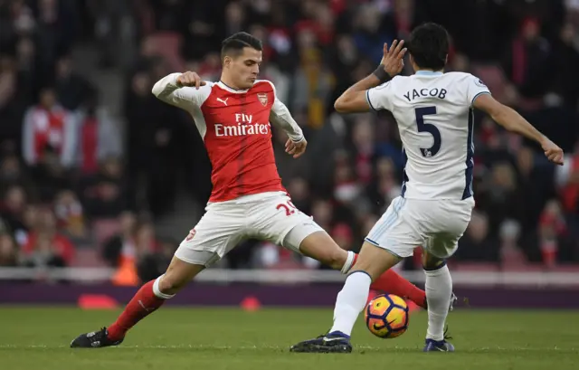 West Bromwich Albion's Claudio Yacob in action with Arsenal's Granit Xhaka