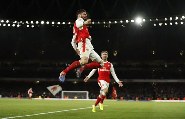 Arsenal"s Olivier Giroud celebrates scoring their first goal with Nacho Monreal