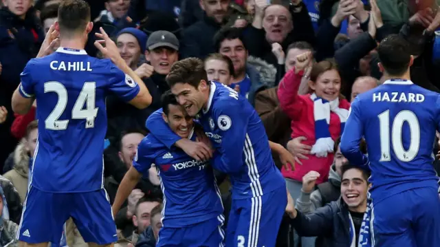 Chelsea players celebrate Pedro goal