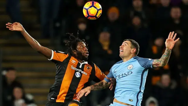 Dieumerci Mbokani and Aleksandar Kolarov