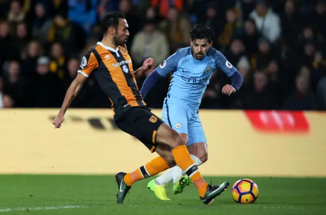 Hull City's Ahmed Elmohamady in action with Manchester City's Nolito