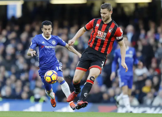 Bournemouth's Simon Francis with Chelsea's Pedro pressing