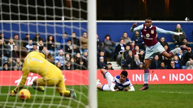 Jonathan Kodjia scores a goal against QPR