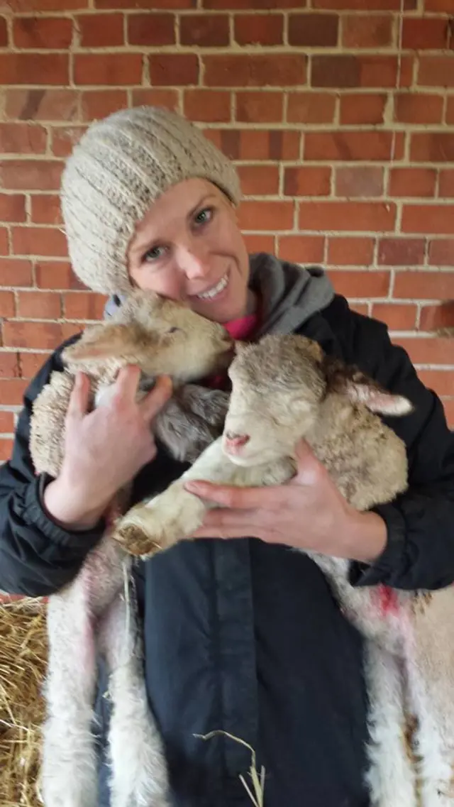 Katie Mitcham-Henry with lambs