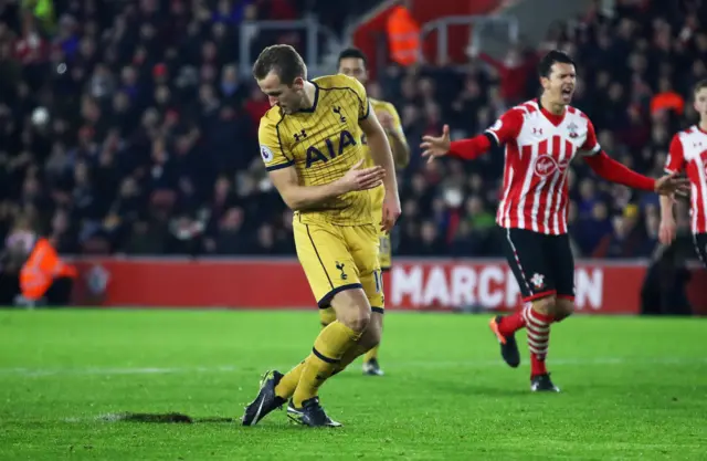 Harry Kane of Tottenham Hotspur looks at the turf