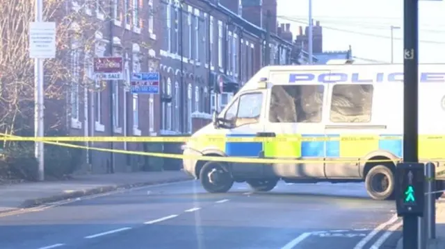 The police cordon at the scene of the shooting