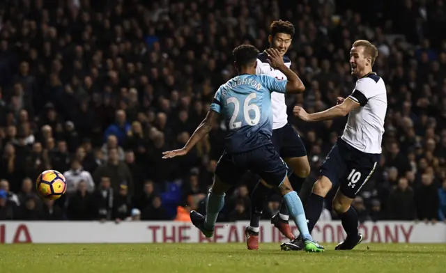 Harry Kane scores their third goal