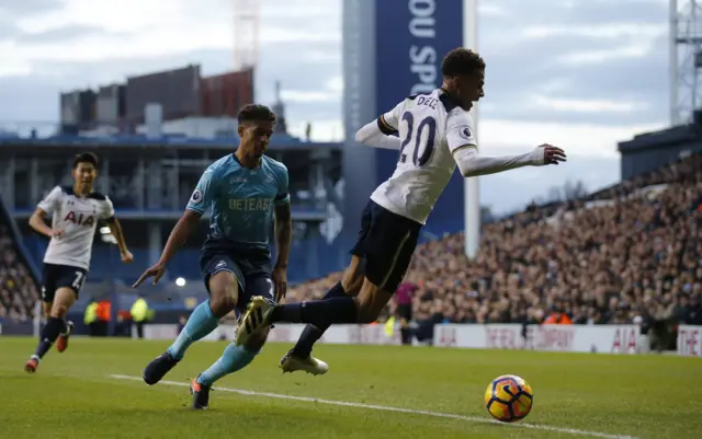 Dele Alli is fouled by Swansea City"s Kyle Naughton