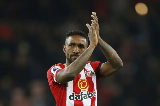 Jermain Defoe applauds the fans