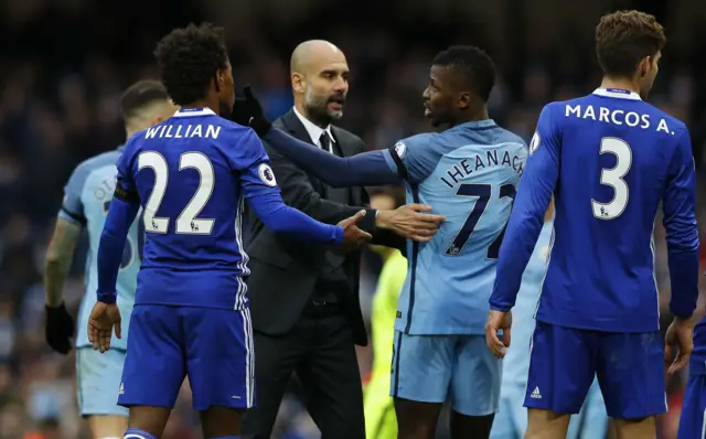 Pep Guardiola on the pitch after the game