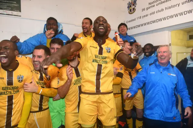 Sutton United players celebrate