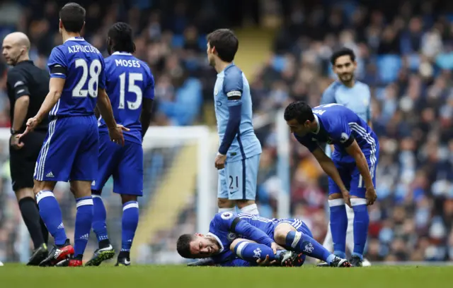 Chelsea midfielder Eden Hazard lies injured