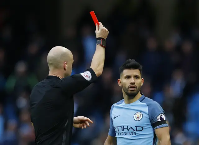 Aguero gets a red card from the referee