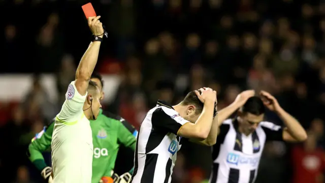 Paul Dummett of Newcastle is sent off